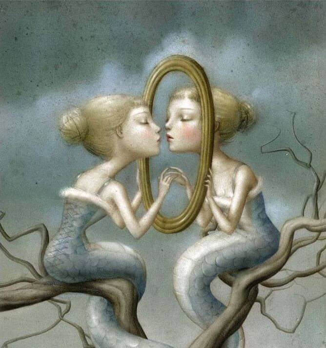 Ihanteellinen ihminen katsoo peilistä