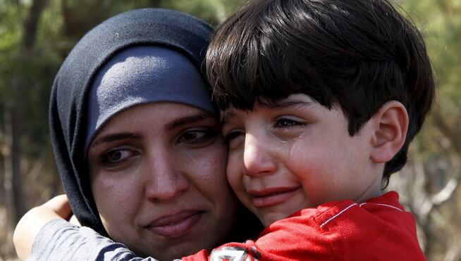 Pakolaiset äiti ja poika