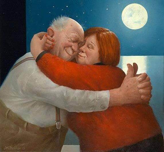 Onnellinen pari halaa