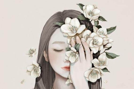 nainen kukat kasvoja vasten