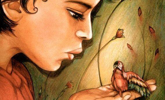 Nainen puhuu linnulle