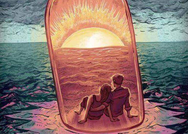 Pariskunta pullossa katselee auringonlaskua