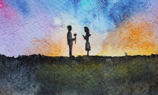 poika ojentaa tytölle kukan