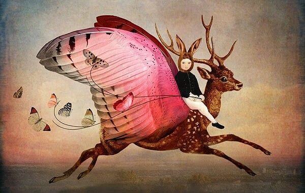 lapsi ratsastaa siivekkäällä peuralla