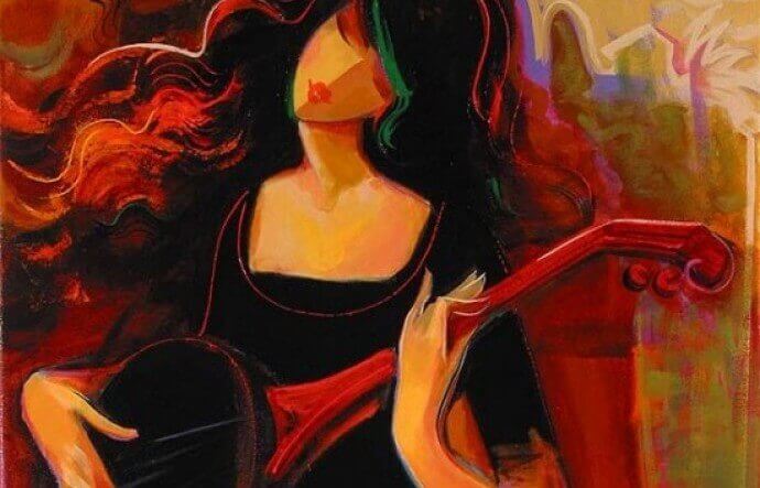 Kitaraa soittava nainen