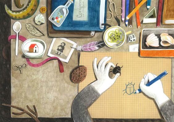 mies piirtää koppakuoriaista