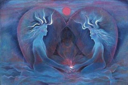 pariskunta suutelee ja takana on sydän