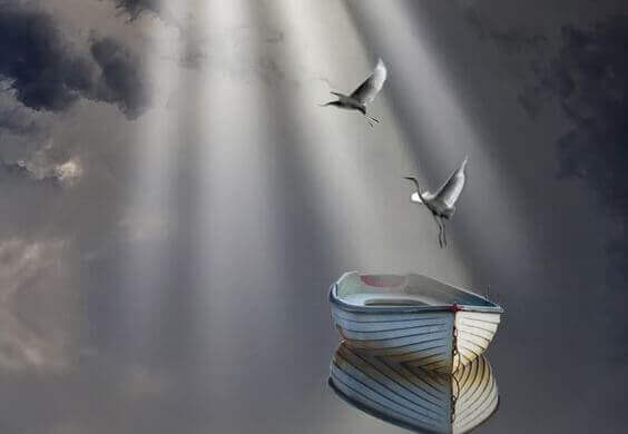 yksinäinen vene ja linnut