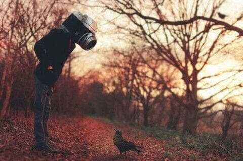 miehen pää on kamera