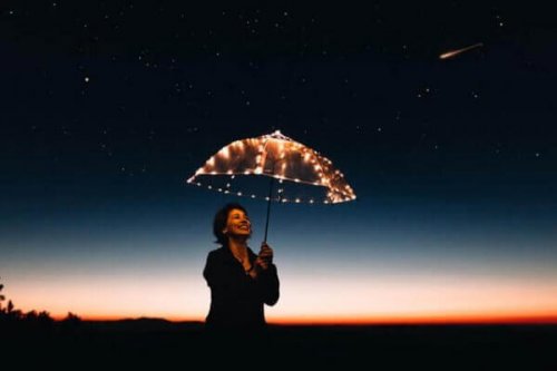 Tehokkaat motivointimenetelmät: nainen ja sateenvarjo